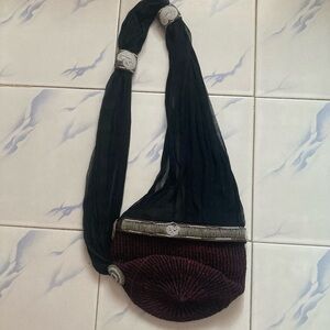 Handmade sheer handle and sisal bottom.. very unique and comfortable